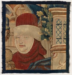 Petit fragment de tapisserie représentant la tête d
