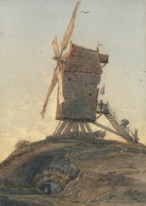 Moulin à vent sur une colline dans un paysage