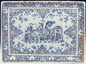 Un plateau rectangulaire de Rouen, peint en bleu et rouge fer - French School