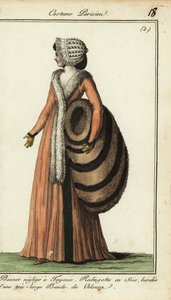 Femme à la mode avec énorme manchon en fourrure