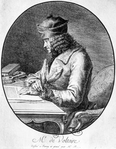 Voltaire à sa table de travail - French School