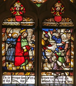 Vitrail représentant la charité de Saint Roch nourrissant les pauvres