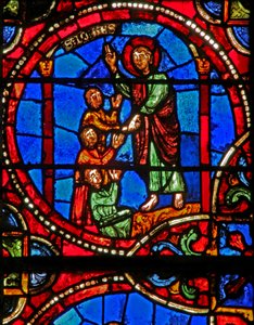 Fenêtre w12 représentant une scène de la légende de Saint Jean : le saint et la coupe empoisonnée : Saint Jean survit et ranime les 3 hommes empoisonnés
