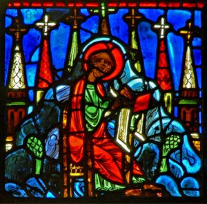Fenêtre w29 représentant Saint Jean à Patmos écrivant aux Sept Églises d