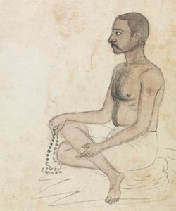 Homme avec des perles de prière