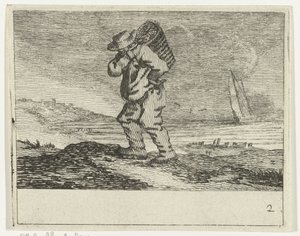 Paysage de dunes avec un pêcheur
