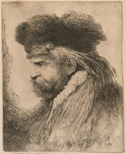 Homme barbu avec un bonnet de fourrure, face à gauche