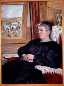 Une vieille femme dans un fauteuil portant une robe noire