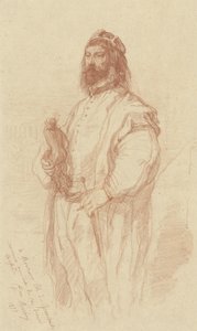 Homme debout avec une statuette