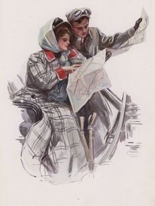 Homme et femme lisant une carte dans une voiture