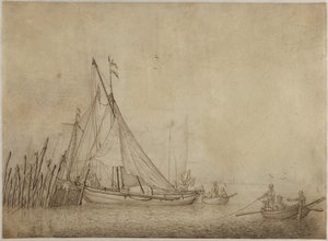 Navires à un barrage de pêche avec une ville en arrière-plan