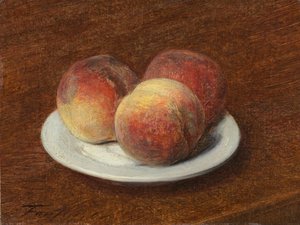 Trois pêches sur une assiette