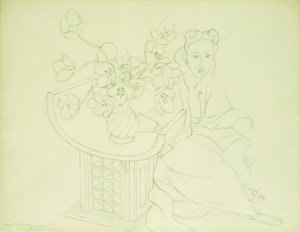 Femme assise avec un vase de tulipes