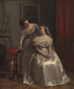 La mariée parée par son amie