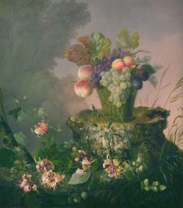 Panier de fleurs avec fruits près d