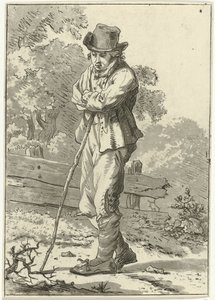 Homme appuyé sur un bâton