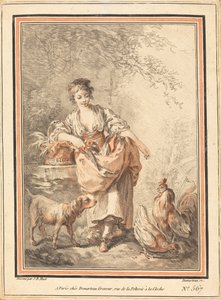 Femme nourrissant des poules