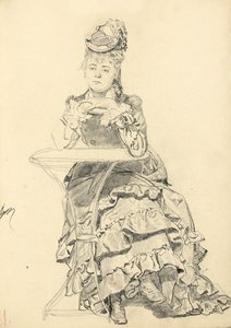 Femme assise à une table de café