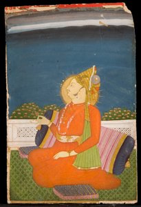 Un dignitaire paré de bijoux, portant un turban à plumes, tenant un bouton de lotus, assis sur une terrasse - Indian School