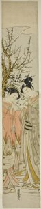 Couple allumant des pipes sous un prunier