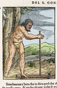 Un homme indigène allumant un feu en frottant deux morceaux de bois. Gravure de « Navigationi et Viaggi » par Giovanni Battista Ramusio (1485-1557), vol. III, Venise 1565. - Italian School
