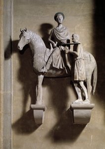 Saint Martin à cheval partageant son manteau avec un mendiant. Sculpture