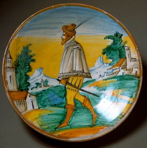 Jeune homme armé. Assiette en céramique produite à Viterbe, Italie. Fin du XVIe siècle. Florence, Museo Nazionale del Bargello