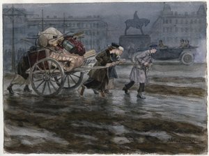 Famille déménageant ses affaires dans une charrette à bras