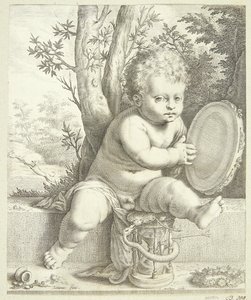 Un enfant jouant du tambourin