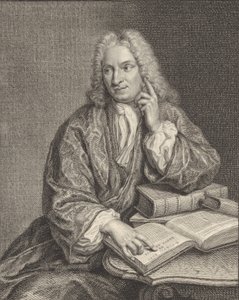 Portrait de Hendrik Snakenburg assis à une table avec quelques livres