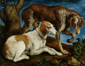 Deux chiens de chasse attachés à une souche d