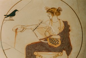 Kylix à fond blanc décoré d