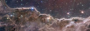 Falaises cosmiques dans la nébuleuse de la Carène (Image composite NIRCam et MIRI)