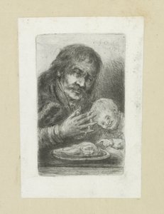 Homme et enfant à la table à manger