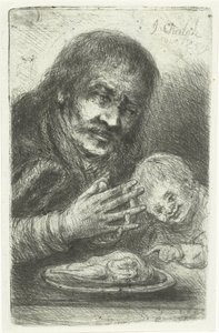 Homme et enfant à la table à manger