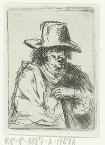 Homme avec un haut-de-forme et une canne