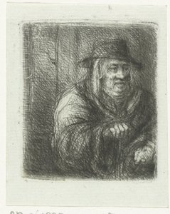Vieil homme avec manteau et chapeau
