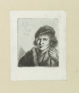 Homme adulte avec chapeau et bâton