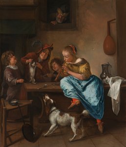 Des enfants apprennent à un chat à danser, c