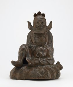 Figure de Shoki, le dompteur de démons, assis sur un rocher, Imbe, préfecture d