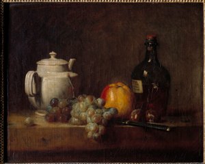 La théière blanche avec raisins