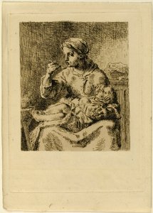 Femme nourrissant son enfant