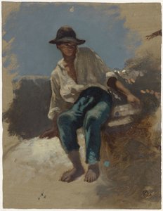 Jeune homme assis avec un chapeau de feutre