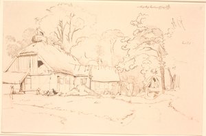 Maison de paysan avec un nid de cigognes sur le toit