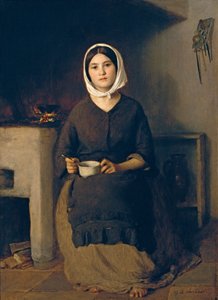 Femme assise dans une cuisine paysanne