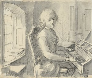 Un pianiste assis au clavier