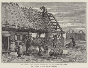 La famine en Russie, paysans prenant du chaume des toits pour nourrir le bétail