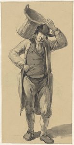 Homme debout avec un panier sur l