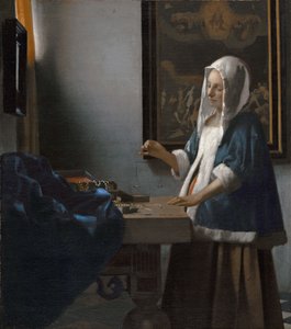 Femme tenant une balance - Johannes Vermeer
