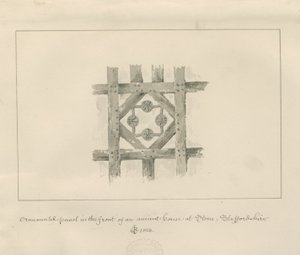 Pierre - Panneau ornemental sur une maison ancienne : dessin au lavis sépia